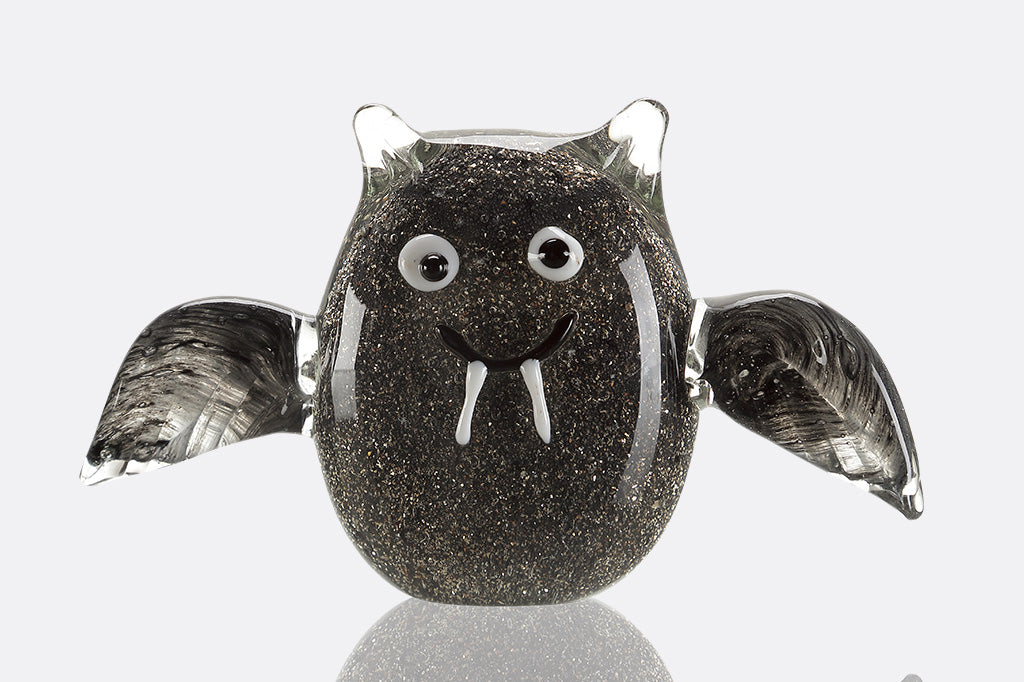 glitter and swirl black glass figuring of bat with fangs