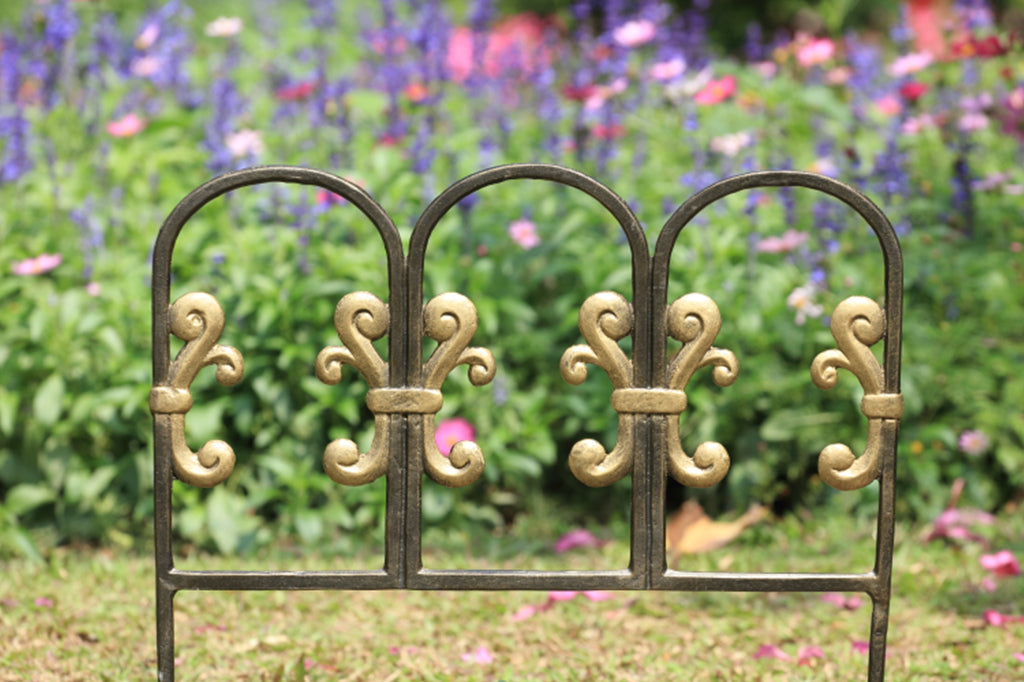 cast aluminum metal garden edging in front of flower bed