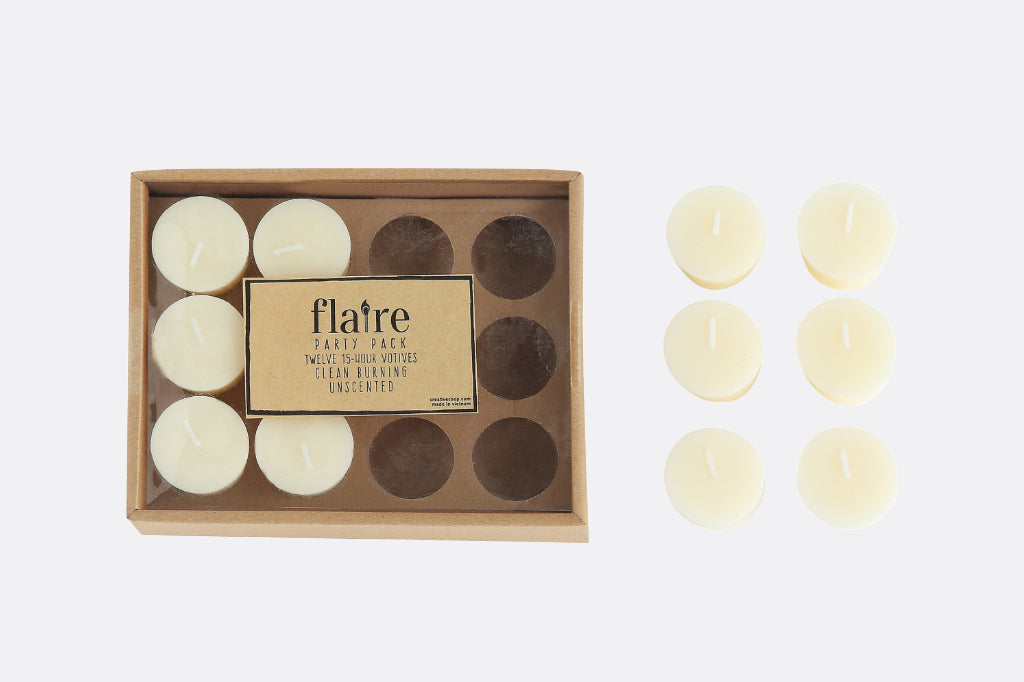 12 votive candles, six shown in box, six shown arranged on the side.