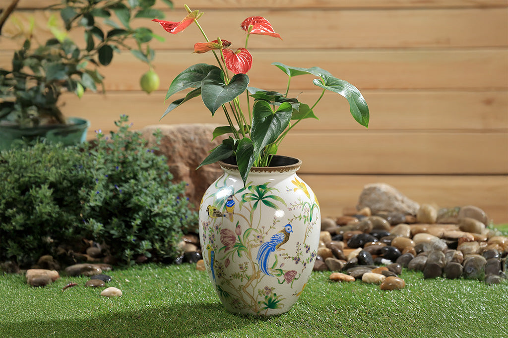 Decorative vase with floral and bird patterns