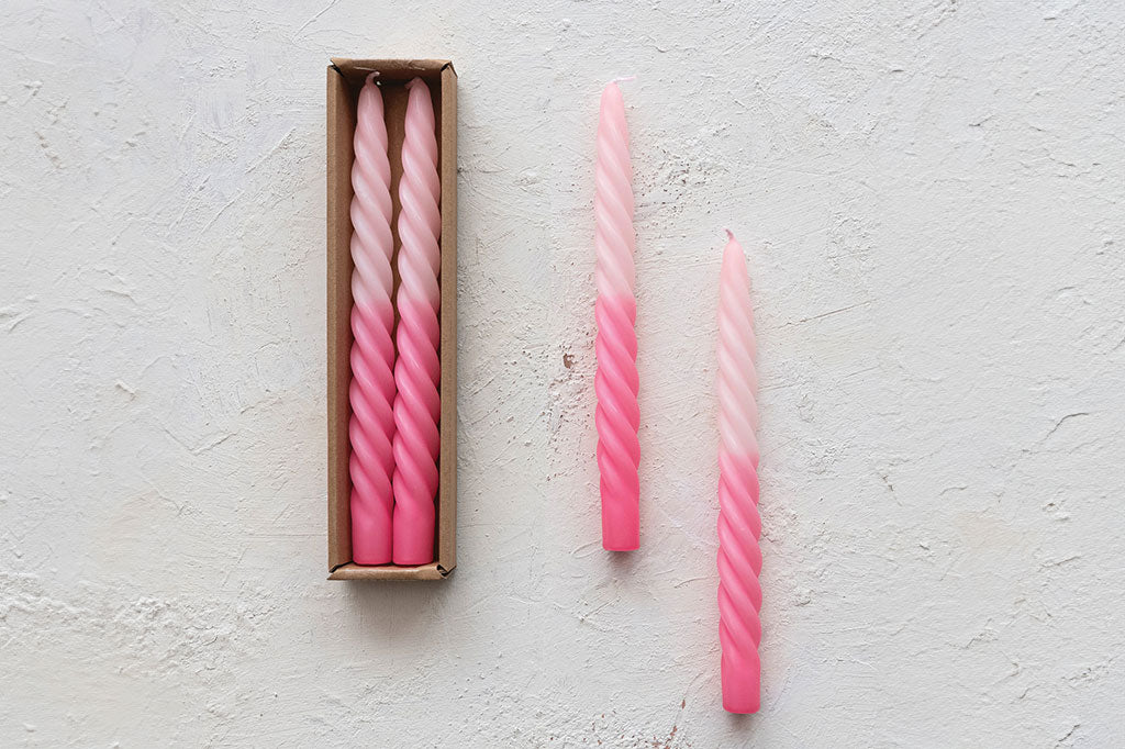 twisted two-tone pink taper candle 