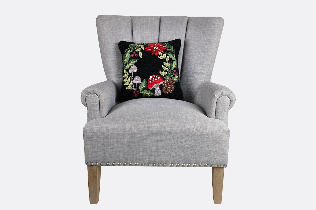 wreath, mushroom and poinsettia hooked pillow