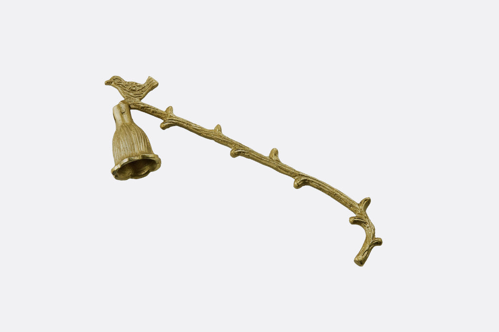 antiqued bronze candle snuffer with bird and branch motif