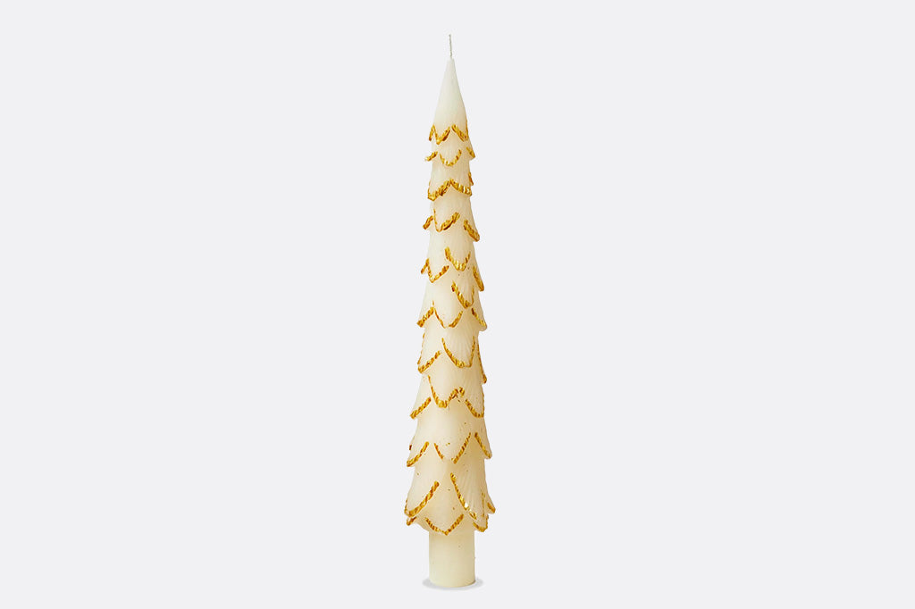 Christmas tree shaped taper candle with golden accents.