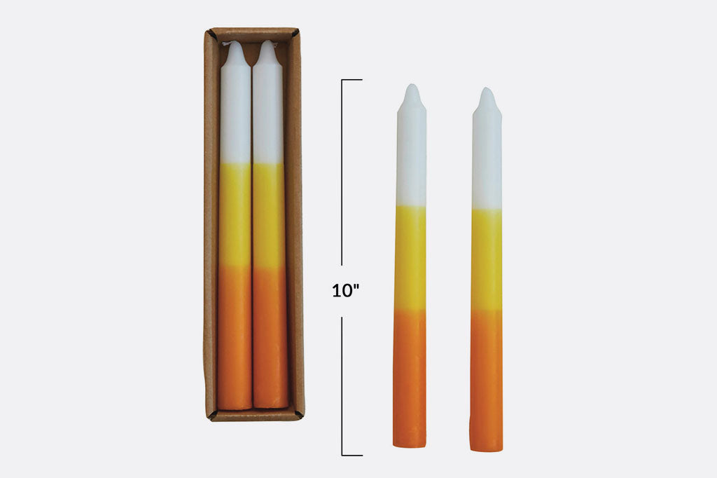 tri-color layers of yellow, orange, and white, these whimsical tapers bring a nostalgic Halloween charm