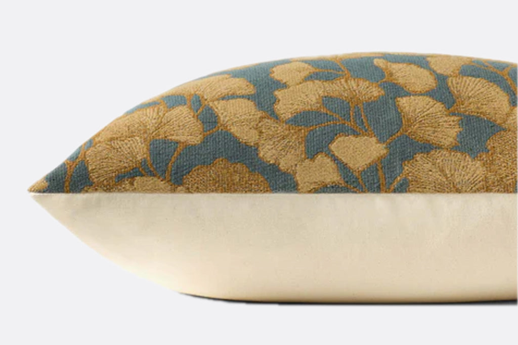 A pillow with ginkgo leaves