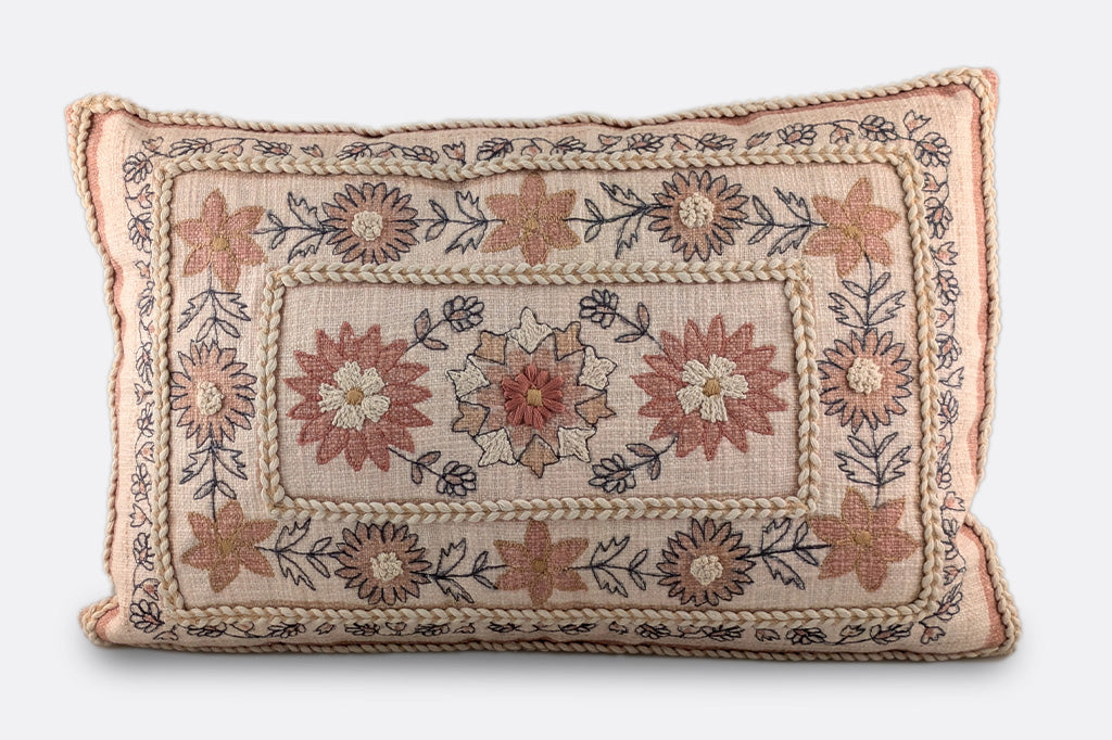 embroidered boho style pillow in creams and russet earth tones, rectangular