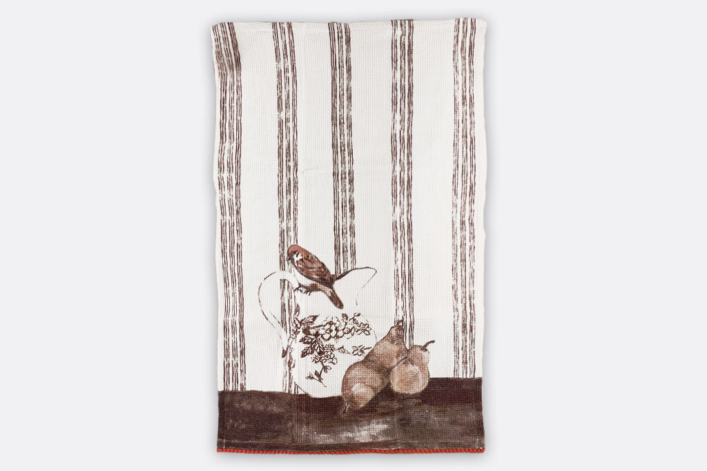 A set of four tea towels with red blue, yellow, and brown stripes. Each Towel features a bird stood upon a pile of assorted fruits.