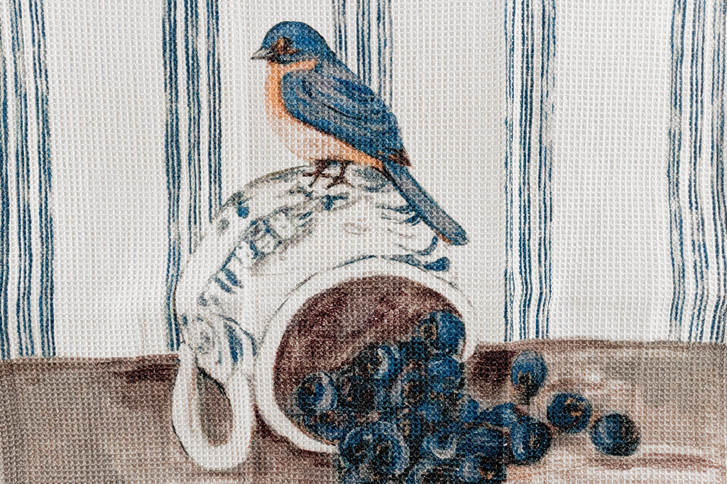 A set of four tea towels with red blue, yellow, and brown stripes. Each Towel features a bird stood upon a pile of assorted fruits.