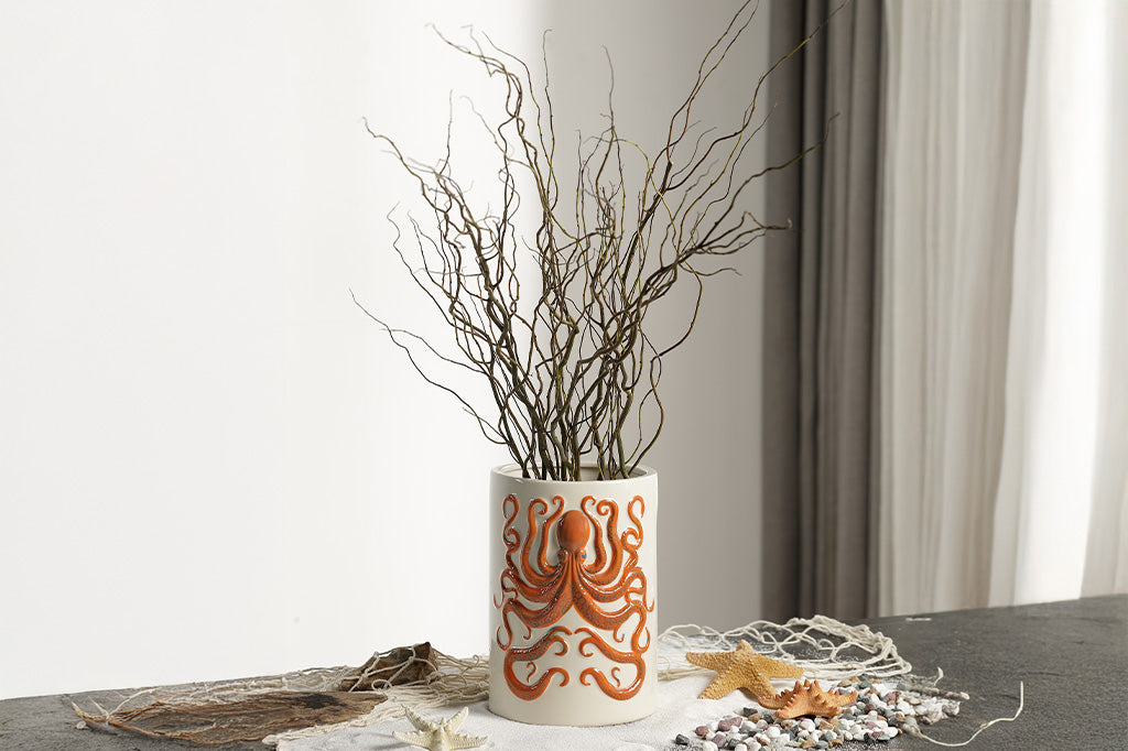 Ceramic vase with an orange octopus design