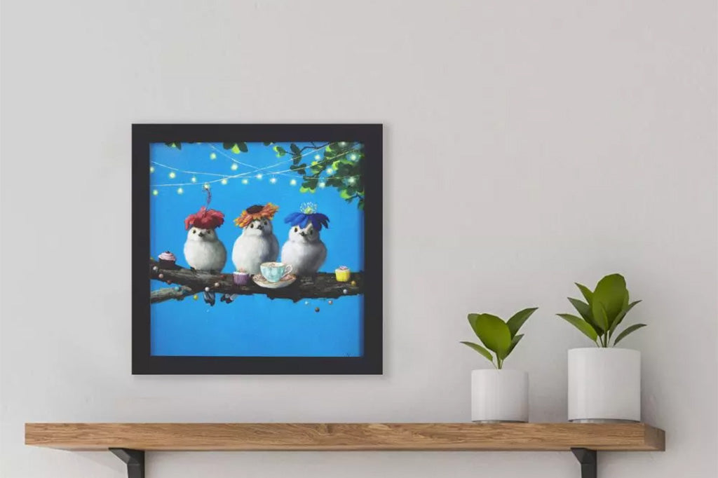 framed art print of 3 birds on a branch having tea party
