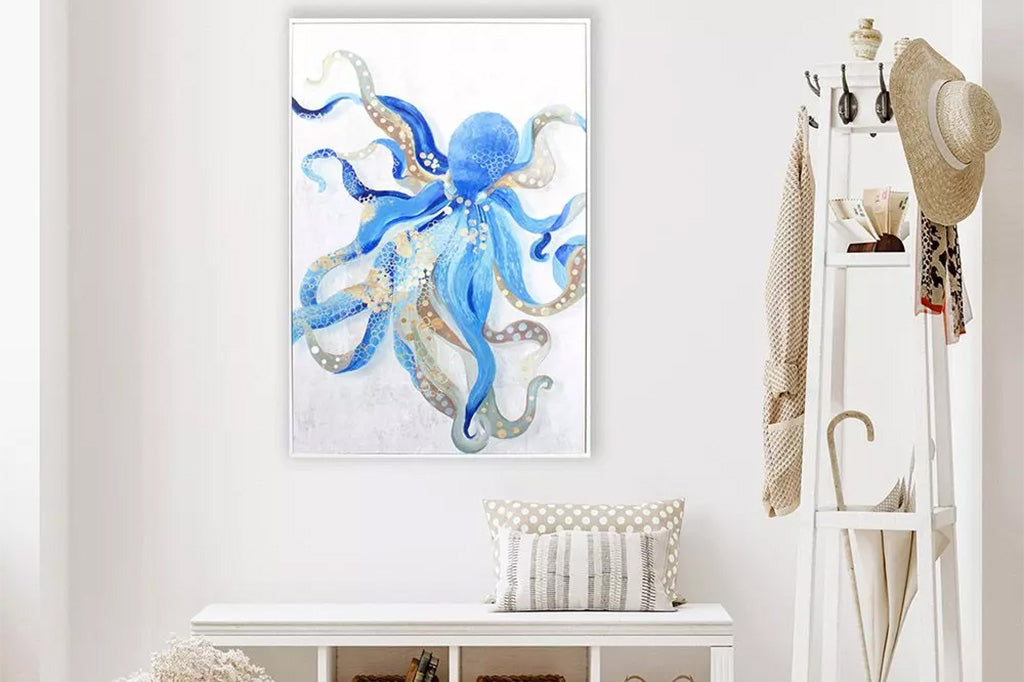 framed artwork of blue water color octopus set in entryway