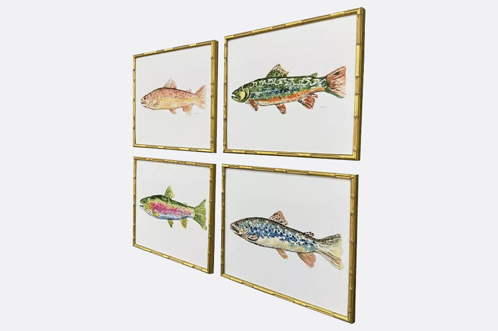 angled view of Set of four colorful trout in gold frame mounted on wall