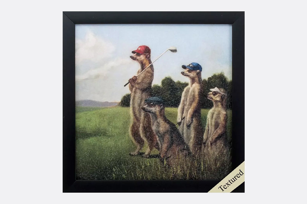 Framed artwork of golfing meerkats