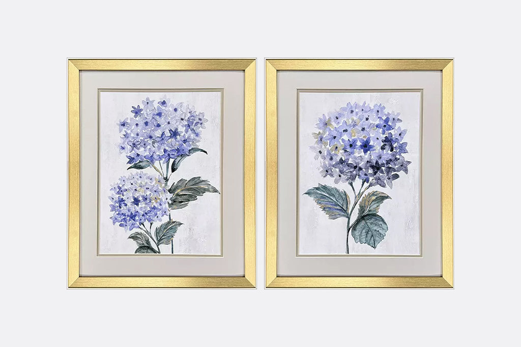 Hydrangea prints are double matted with a neutral top mat and pewter. Framed in a modern gold finish moulding with champagne side and lip.