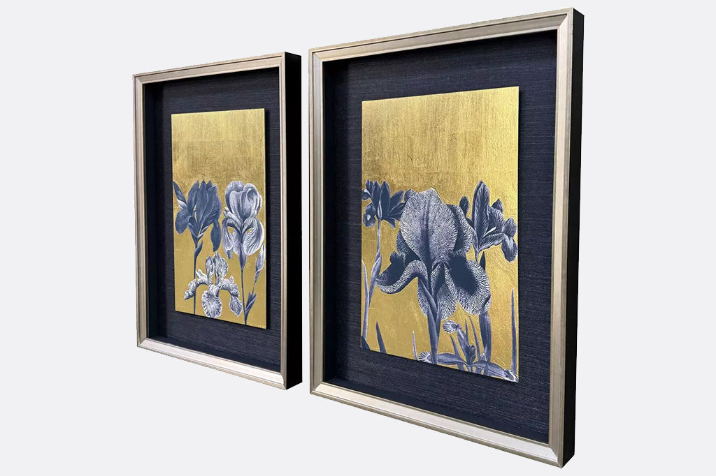 Giclee with hand applied gold leaf. Matted and framed in a silver leaf wood shadow box moulding with gold wash edging and black side.