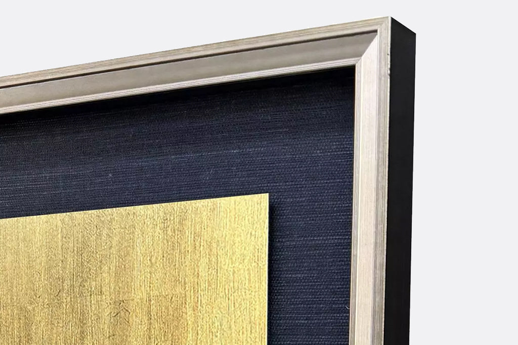 detailed view of gold frame on iris print
