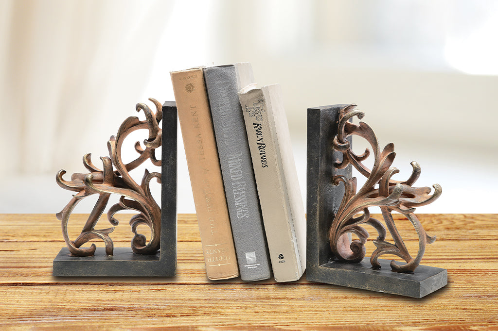 elaborate scrollwork bookend pair