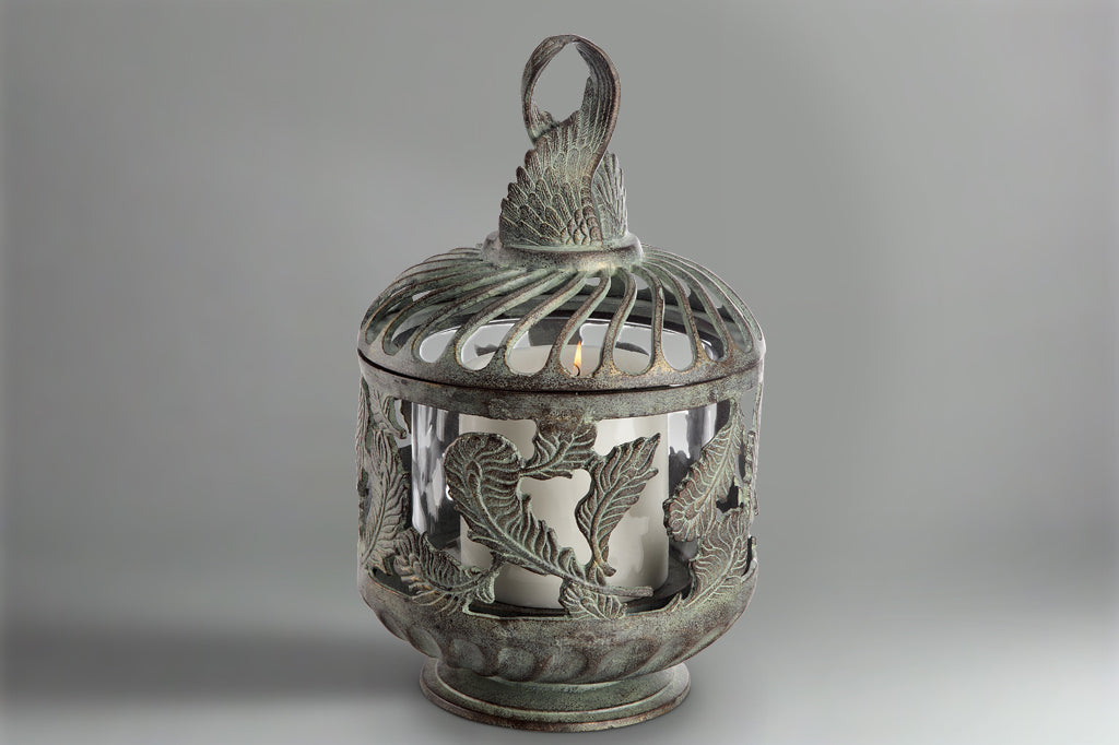 green and zinc and bronzy finish on cast metal short lantern with feath motif. Shown with large pillar candle
#color_Verdigris