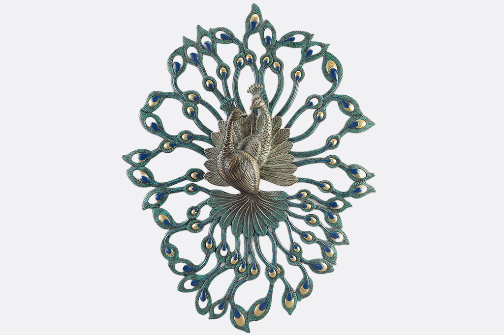 large peacock theme cast metal wall art showing two peacocks entertwined in 3D relief