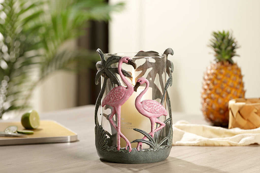 Pink flamingo candleholder with palm leaves and palm tree