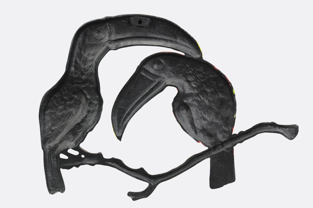 Back of metal toucan wall plaque showing one mounting hook