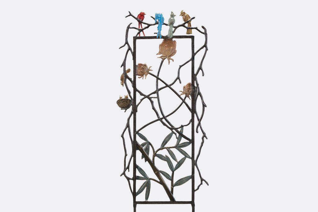 Metal garden trellis featuring quartet of birds, clovers and thistle motifs back view 