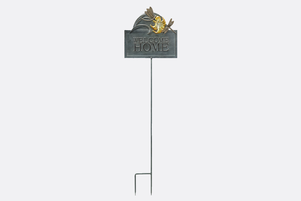 Metal dragonfly and lily welcome home sign