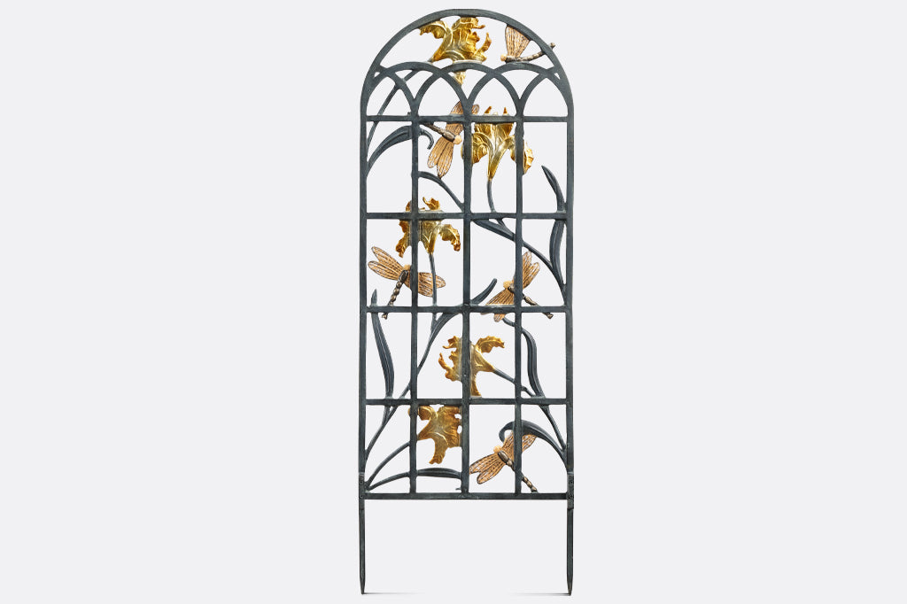 back side of garden trellis, metal panels and stakes