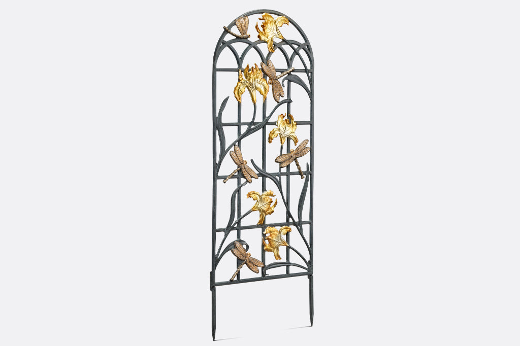 side angle view of cast aluminum metal iris and dragonfly garden trellis