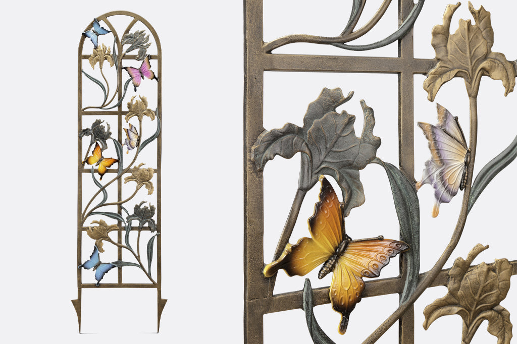 detailed view of floral and butterfly motifs on trellis. One yellow and back winged butterfly and light purple and yellow winged butterfly