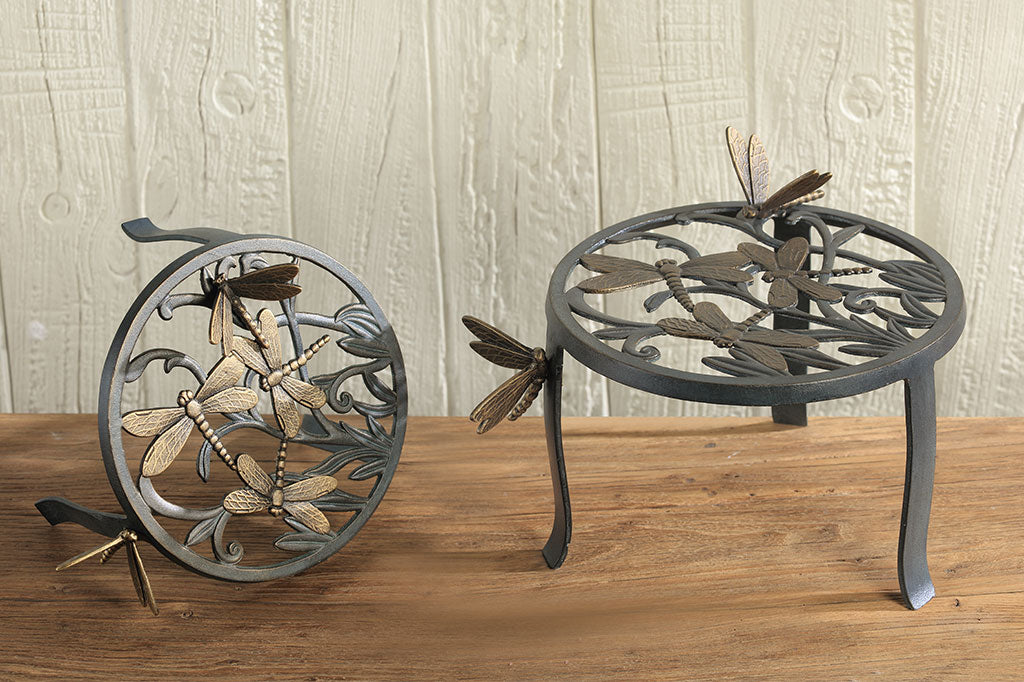 cast metal plant stand set of two, dragonflies and foliage stands with removable dragonfly details on legs of plant stand.