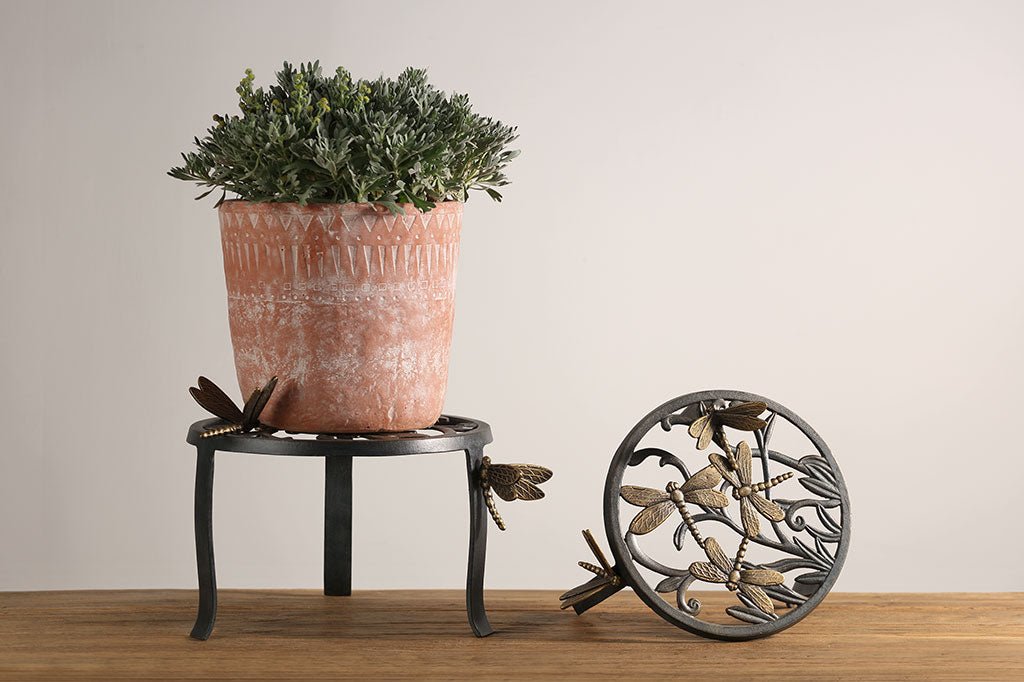 cast metal plant stand set of two, dragonflies and foliage stands with removable dragonfly details on legs of plant stand.