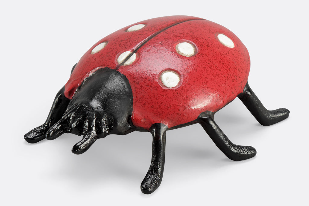 speckled red lady bug garden sculpture