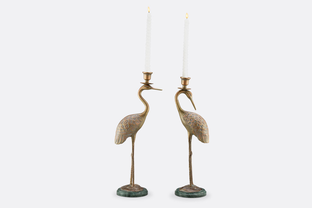 cast metal crane taper candleholders with marble base
