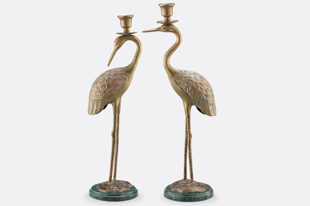 cast metal crane taper candleholders with marble base