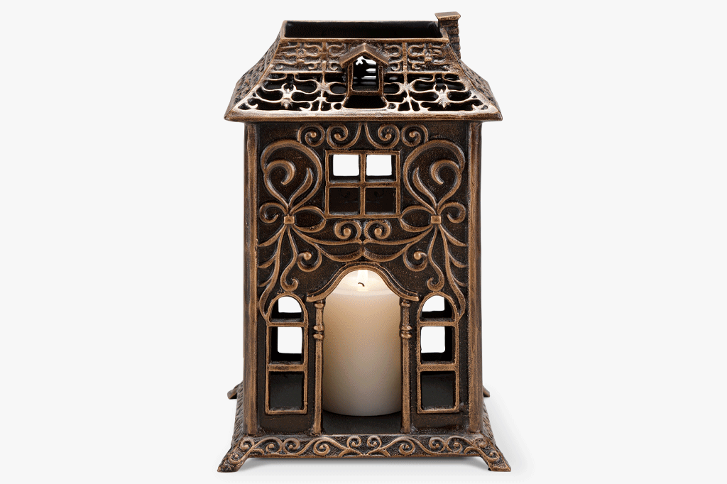 animation of different sides of the Jolie Maison Candleholder sculpted house