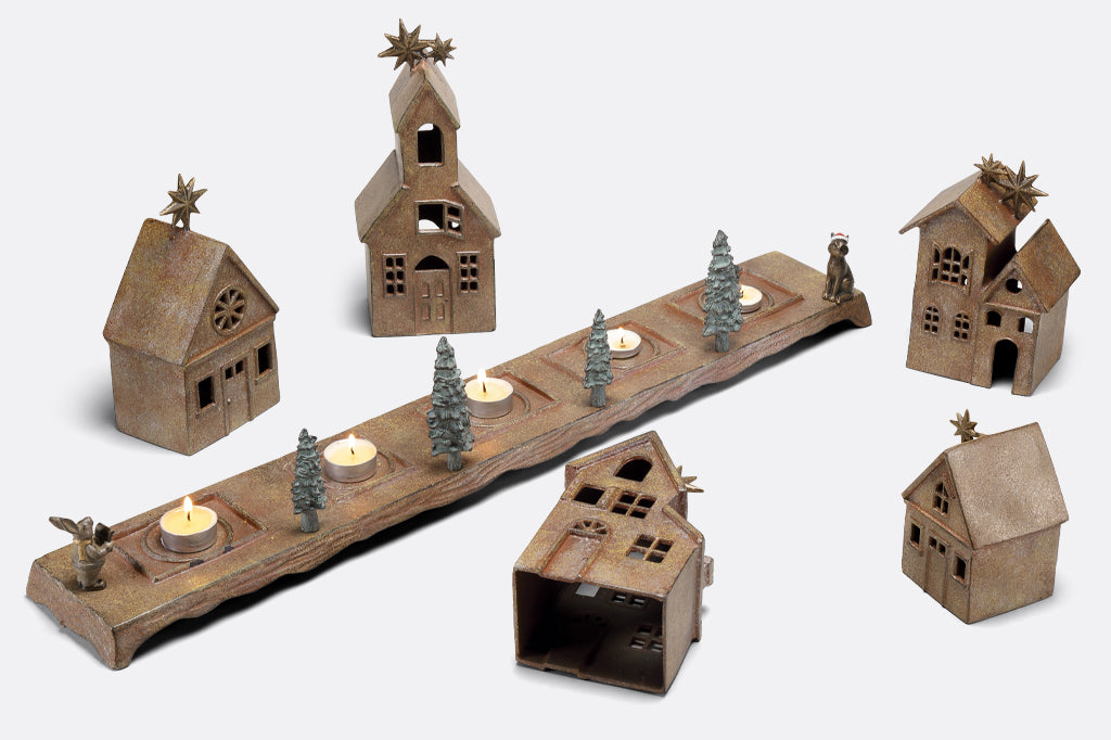 Removeable and interchangeable house order , place candles inside the holiday villages