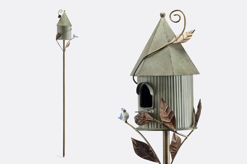 cast metal birdhouse with blue jay detailing, cottage fairy tale style home