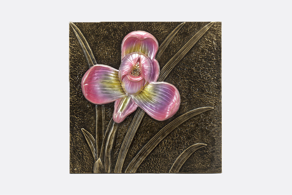 Bronze decorative wall tile with metallic pink/violet orchid motif