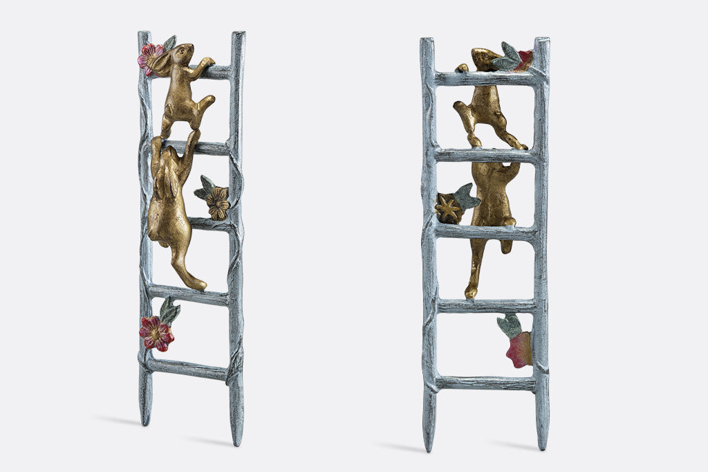 side and back views of mini planter trellis. Features 2 golden rabbits climbing a ladder with flower vines.
