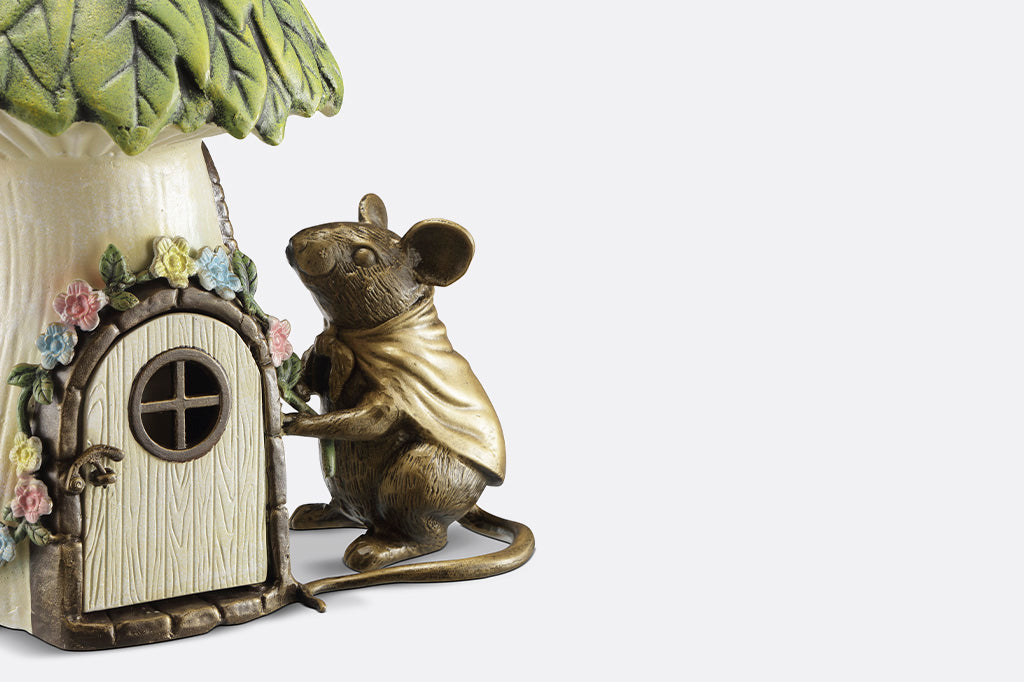 Garden candle lantern shaped like mouse and cottage - mouse close-up view