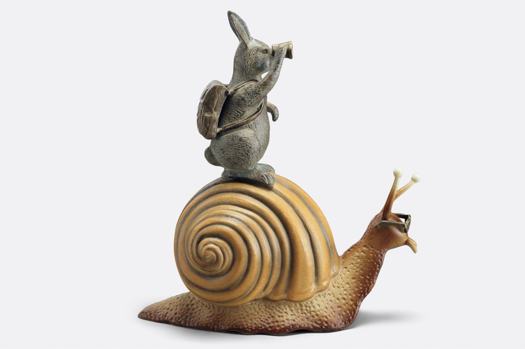 cast metal garden sculpture adventuring rabbit with binoculars riding on a snail with sunglasses