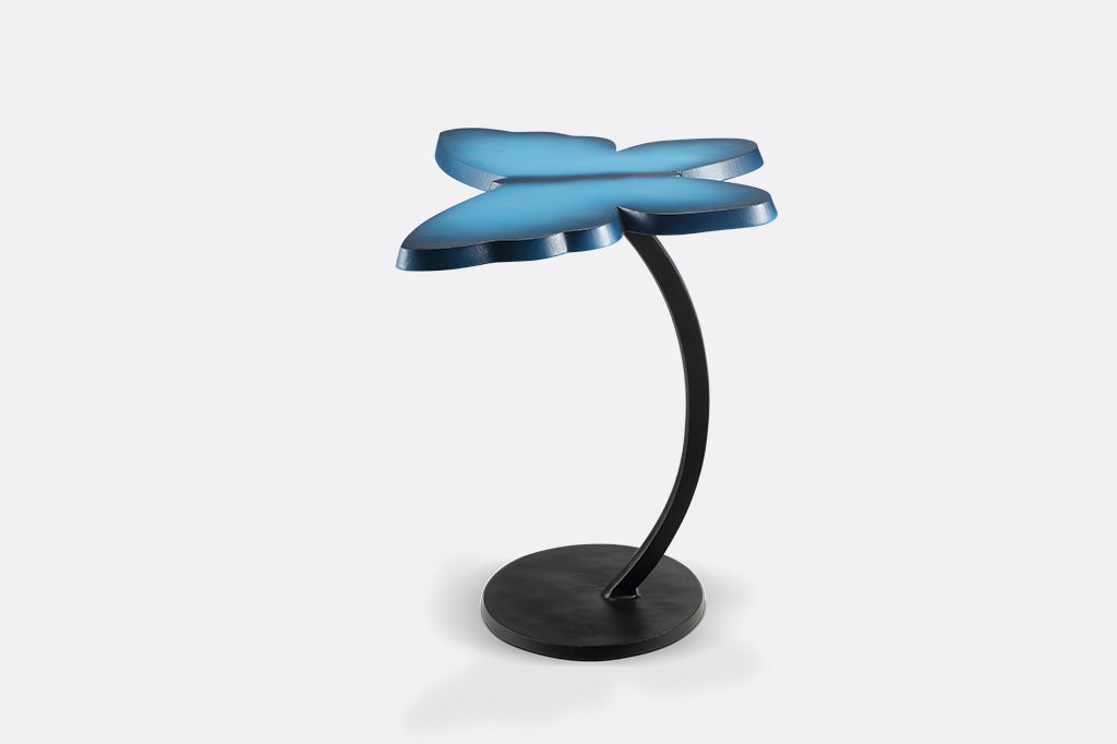 modern blue accent table with butterfly silhouette