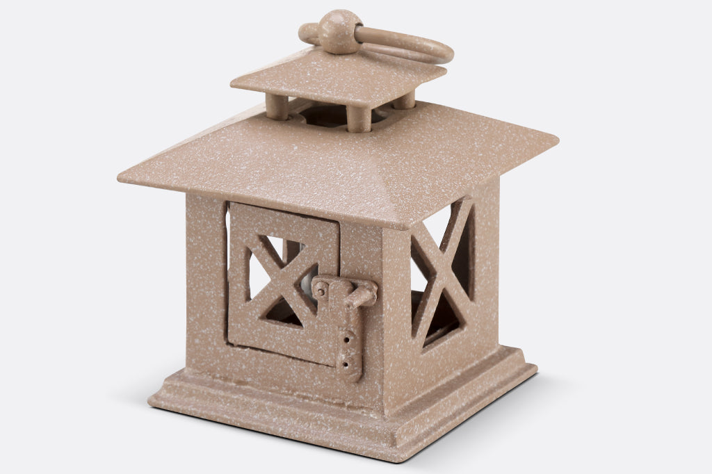 cast metal lantern in tan with white speckles #color_sand