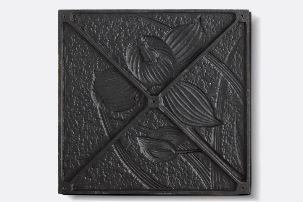 back of stepping stone, relief of orchid design