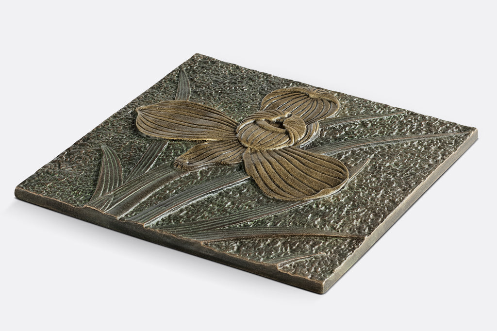 side view of orchid stepping stone, slight raised design of orchid flower