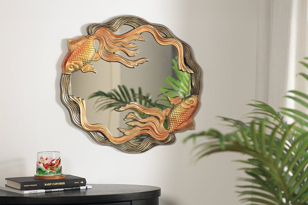 golden koi circular mirror on wall above console table