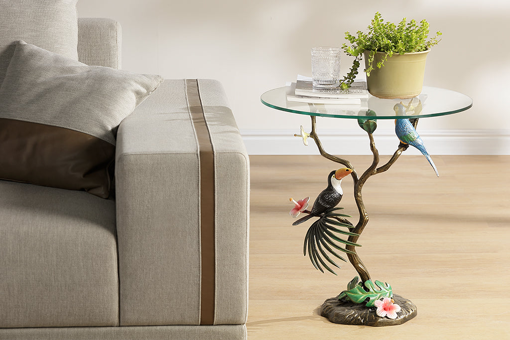 cats metal accent table featuring toucan and parrot set next to couch in living room