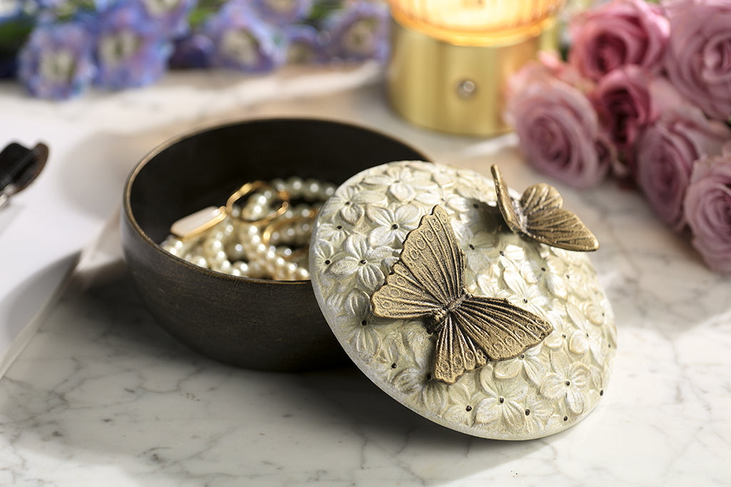 cast metal hydrangea box with removable lid with two butterflies on top , shown with jewelry inside box